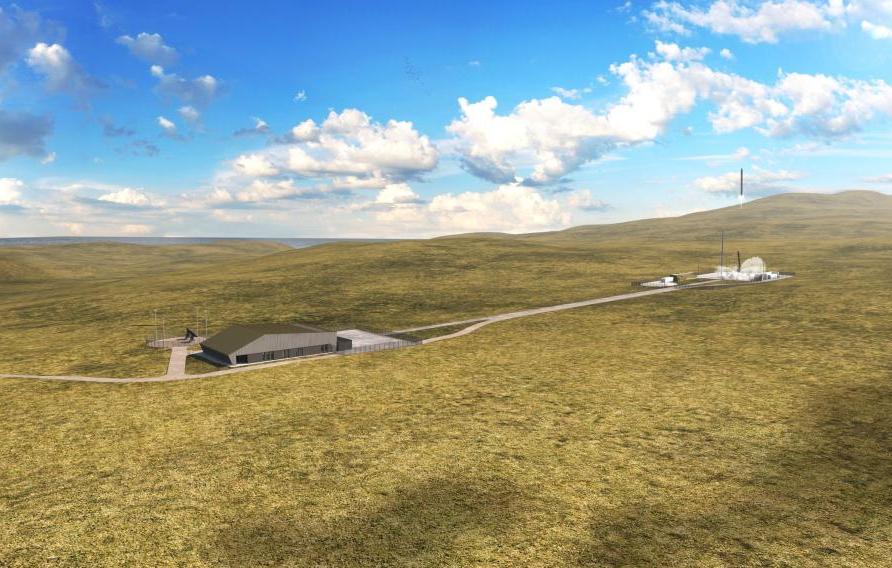 Small facility in the middle of a barren field in blue skies